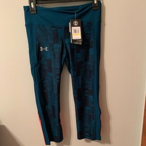 Under Armor Capri running tights, brand new.